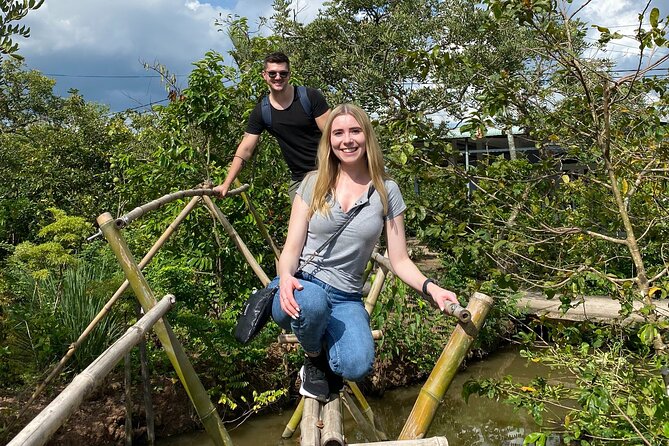 Cu Chi Tunnels and Mekong Delta - VIP Tour - Rowboats, orchards, coconut candy, and a real bee farm stop