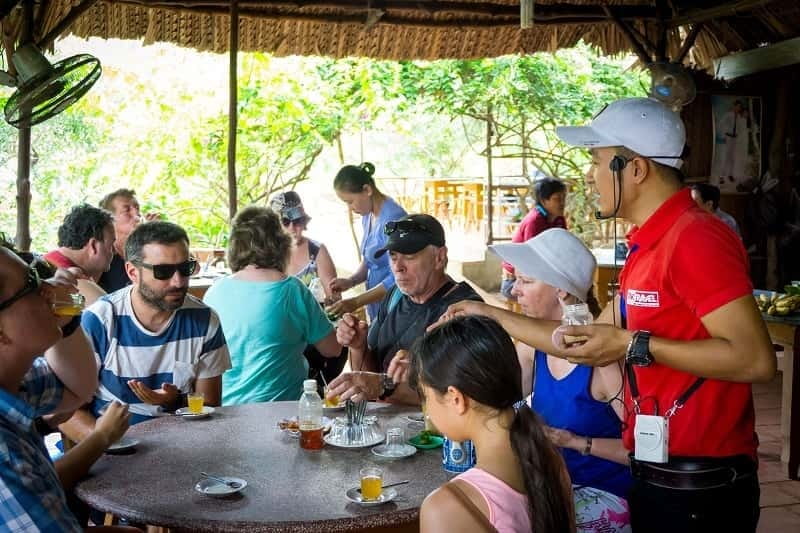 Essential Mekong Delta: Highlight Tour from Ho Chi Minh City - Cù lao Thới Sơn: Fruit tasting, honey tea, and folk music in an orchard