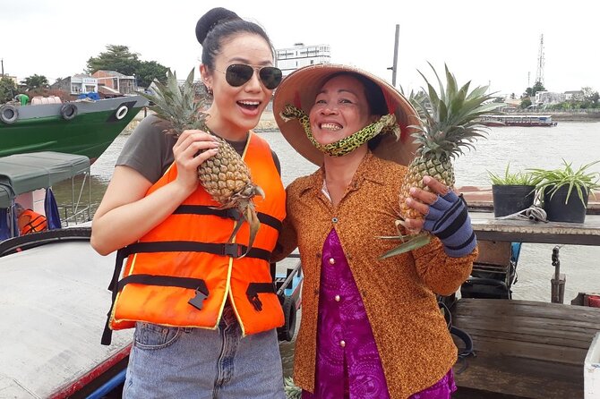 HCM: 2-Day Mekong Delta Floating Market with Cooking & Bike Ride - First Stop: Vinh Trang Pagoda and the Rice-Field Road In