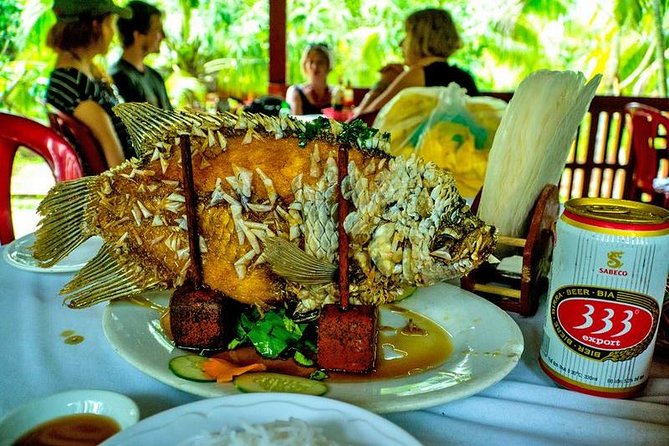 HCM:Mekong Delta Boat,Khotcake cooking Coconut Village,SmallGroup - Vinh Trang Pagoda: southern architecture in the middle of the trip