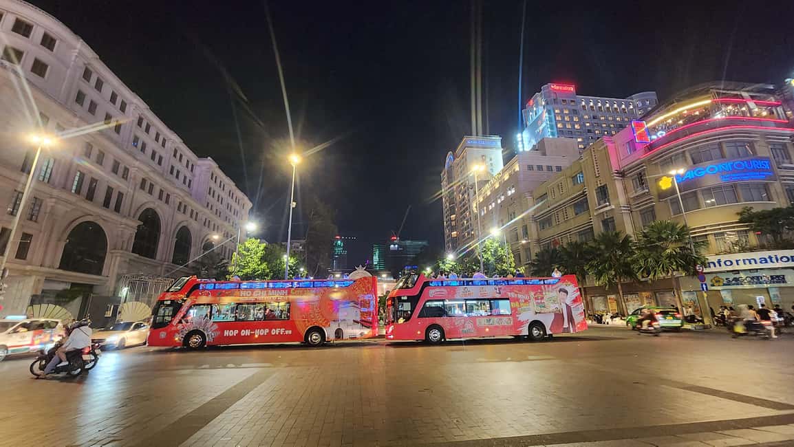 Ho Chi Minh City: Late-Night Open-Top Bus Tour - Getting on the red double-decker: meeting point and first minutes