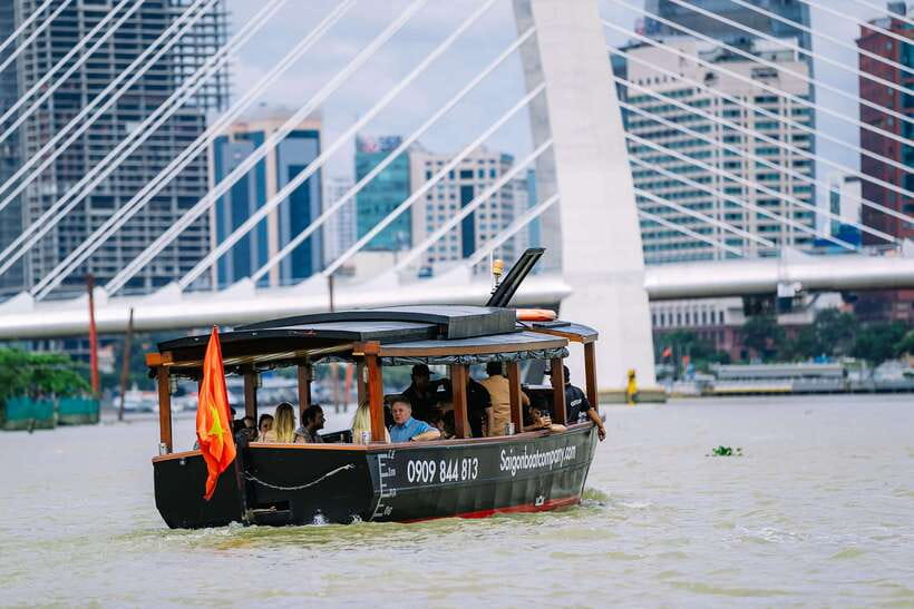 Ho Chi Minh City: Saigon River Boutique Cruise - The guide makes the hour: humor, names you might hear, and real context
