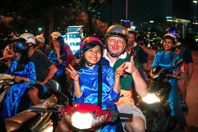 Ho Chi Minh Night Tour by Motorbikes with Female Rider | KissTour - The Scooter Ride Through Old and Everyday Saigon
