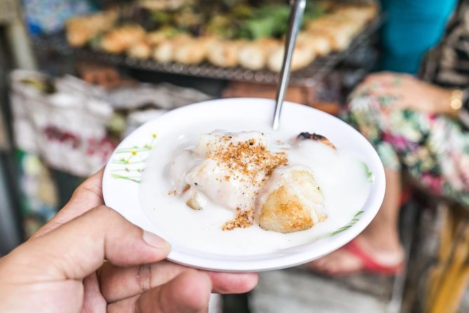 Ho Chi Minh Street Food Tour By Motorbike (Unique & Authentic) - District 3 to Ho Thi Ky Flower Market: watching bánh xèo and bánh khọt being made