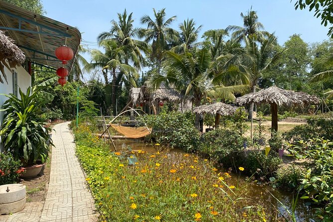 Mekong Delta Nature Cano-Kayak-Cycling & Fishing Private Day Trip - Family Tiny Garden to Xom Trau Pagoda: Cycling Through Rice Fields