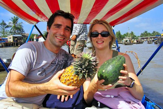 Mekong Delta Tour Full Day Cai Be-Vinh Long - Food is the main event: lunch set menu, bánh xèo, coconut juice, and fruits