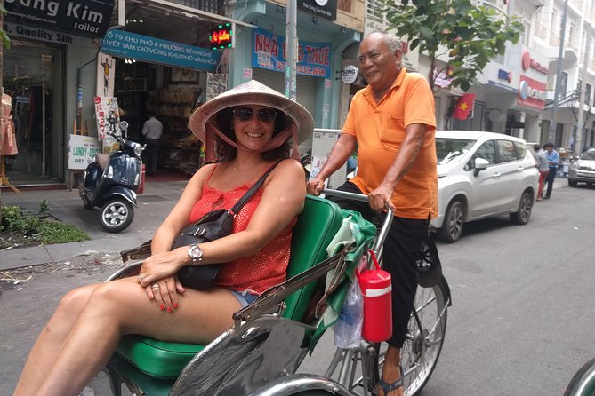 One hour cyclo tour around Saigon - Independence Palace: 1963 building, 1975 ending, and tanks still visible