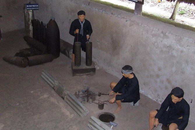 Private Cu Chi Tunnels Half Day Tour - Going into the tunnels: crawl options, heat, and the torch routine