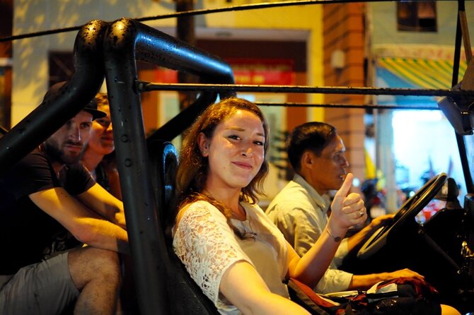 Private Jeep Tour Saigon by Night: Foodie & City Tour - Independence Palace after dark: fast, historic, and photo-ready