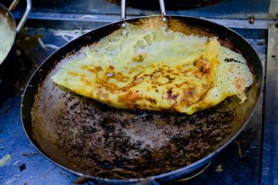 Private Street Food Evening Walking Tour in Ho Chi Minh City - Pickup by taxi, then street-level reality
