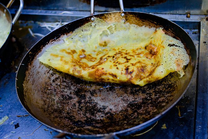 Private Street Food Evening Walking Tour in Ho Chi Minh City - Pickup by taxi, then street-level reality
