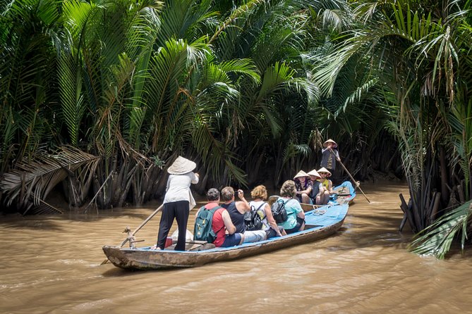 Private Tour to Explore Cu Chi Tunnels and Mekong Delta - Coconut candy mill and honey tea: small eats that feel local