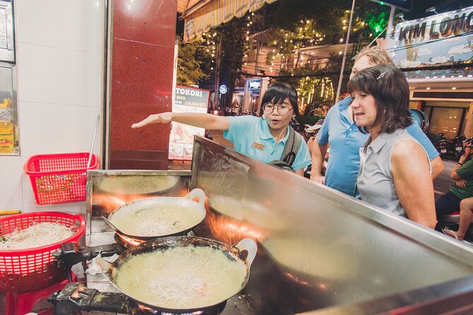 Saigon After Dark Night Tour by Scooter + 7 tastings - Ho Thi Ky flower market: sweets, smells, and learning banana cracker