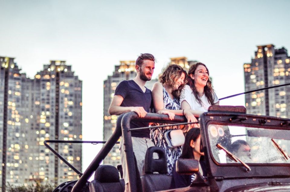 Saigon by Night: Private City Tour by Jeep and Skybar Drink - Night Market Streets and Shopping Stops You Can Actually Use
