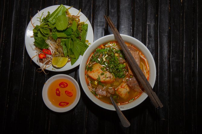 Saigon Night Street Food and City Tour on Scooter - Stop 4: BBQ time and the joy of street grilling