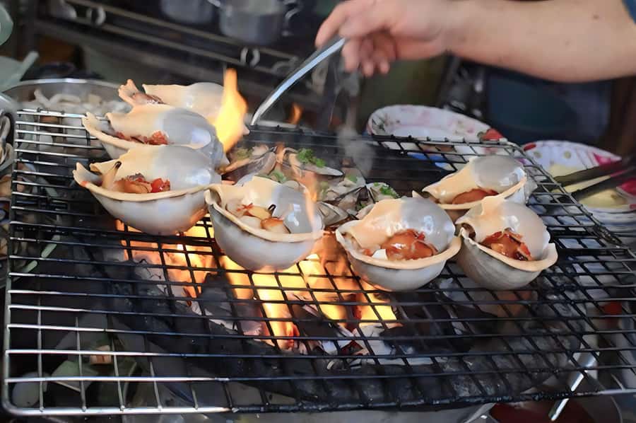 Saigon: Private Backstreets Walking Food Tour - Taxi to District 10: finishing where locals hang out
