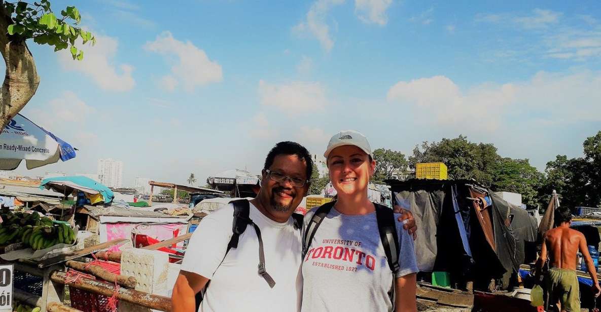 Saigon Slum Tour with Motorbike - From upscale District energy to slum streets inside the city