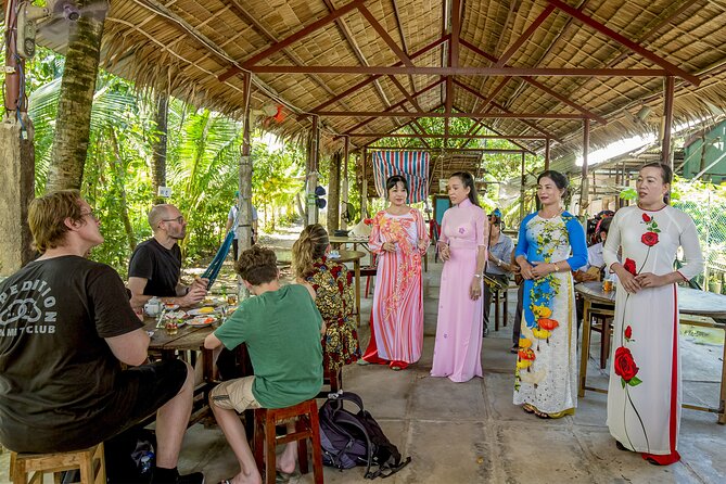 Small-Group Mekong Delta Day Trip: Boat Ride, Cottages & Pagoda - Ben Tre island time: coconut candy and honey production