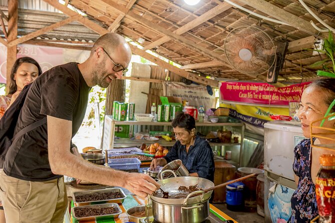 Small-Group Mekong Delta Day Trip: Boat Ride, Cottages & Pagoda - Getting on the boats in a busy Mekong: manage expectations