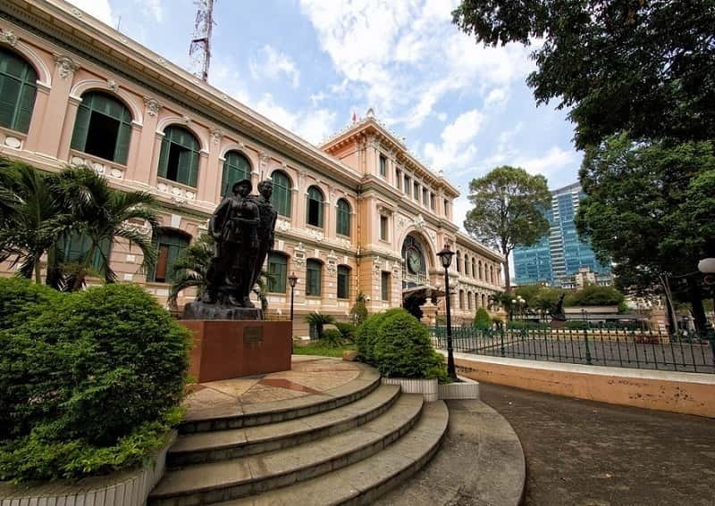 Small Group Tour: Ho Chi Minh City and Cu Chi Tunnels - Saigon landmarks on a schedule: Reunification Palace, Notre Dame (outside), and the Central Post Office