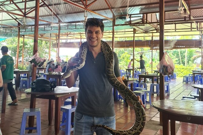 VIP Tour: Cu Chi Tunnels & Mekong Delta 1 Day | Shooting Guns - The Mekong Delta and My Tho: boat time on the Tien River